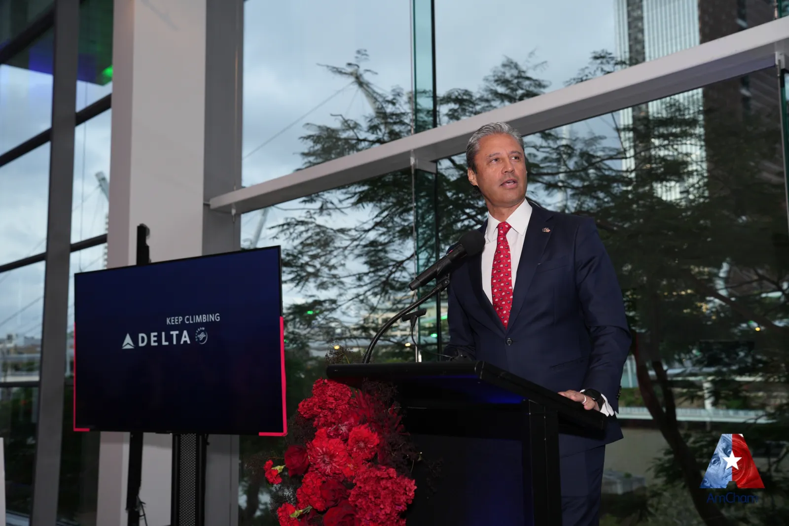 A keynote speaker presenting at the lectern — the kind of authoritative session footage that becomes full replays, highlight reels and dozens of social clips.